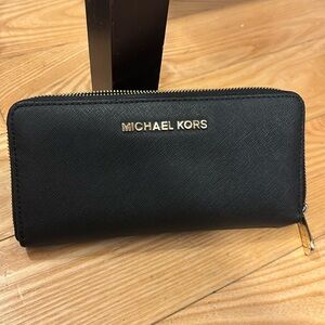 Michael Kors 8” x 3 1/2” Black Wallet with Gold Hardware